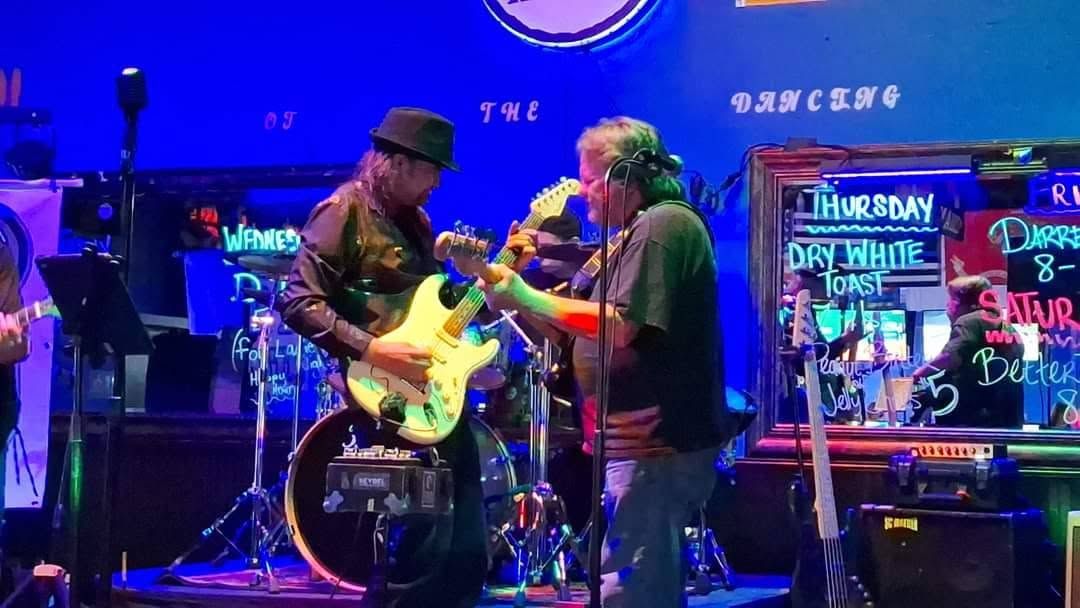 Guitarists on stage