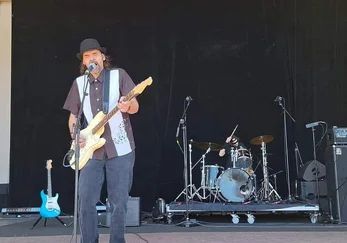 Guitarist on an outdoor stage